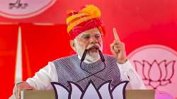 Prime Minister Narendra Modi speaks during a public meeting ahead of Rajasthan Assembly elections.