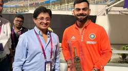 CAB President Snehasish Ganguly gifts gold-plated bat to Virat Kohli.