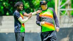 Zimbabwe head coach Dave Houghton (right).