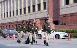 Armed security personnel patrol the Parliament House premises after a security breach on the anniversary of the 2001 Parliament terror attack on Wednesday