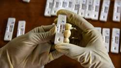 A healthcare worker conducts Covid-19 test, amid a rise in coronavirus cases in the country, in Hyderabad. 