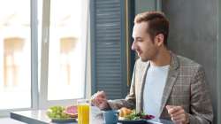 man eating breakfast