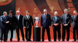 European club owners with UEFA Champions League Trophy