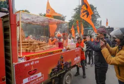 Devotees take part in a padyatra taken out from Vadnagar in Gujarat to Ayodhya in Uttar Pradesh as it passes through Lucknow