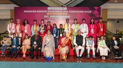 President Droupadi Murmu with Union Minister for Women and Child Development Smriti Irani and others poses for photos during the Pradhan Mantri Rashtriya Bal Puraskar presentation ceremony at a function in New Delhi.