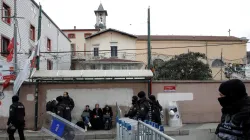 Turkish police stand guard outside the Santa Maria Catholic Church in Istanbul