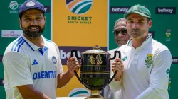 Rohit Sharma and Dean Elgar with the Freedom Trophy.