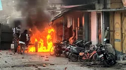 Vehicles set on fire by miscreants over the demolition of an "illegally built" madrasa at Banbhoolpura area, in Haldwani, Uttarakhand.