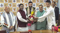 Haryana BJP President and OBC leader Nayab Singh Saini being greeted by senior party leaders. 