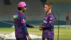 Rajasthan's head coach Kumar Sangakkara having a word with Adam Zampa.