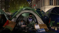 Students prepare to camp overnight as they continue to protest on Columbia University campus in supp