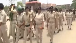 Chapra Police flag march after one killed in a scuffle between BJP and RJD workers