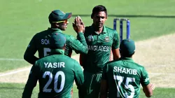 Mustafizur Rahman celebrates a wicket with Shakib Al Hasan.