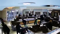 Surveillance camera captures approximately 20 robbers ransacking a jewellery store in California