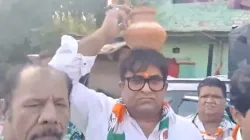 
Congress workers hold 'Matka phod' protest in Krishna Nagar against water crisis in the national capital.