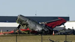 Debris from two planes that crashed during an airshow at Dallas Executive Airport are shown in Dalla