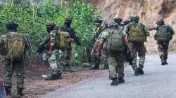 Army personnel conduct search operation after bus carrying pilgrims was ambushed by terrorists