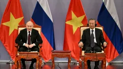 Russia's President Vladimir Putin and Vietnam's President To Lam take part in an event attended by t