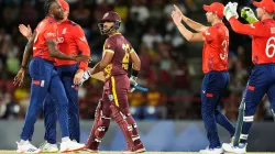 England players celebrate Nicholas Pooran's wicket.