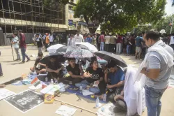 Students stage a protest after three civil services aspirants died due to drowning at a coaching centre in Old Rajinder Nagar area