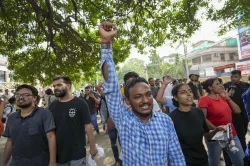 Students raise slogans during a protest over the deaths of three civil services aspirants due to drowning at a coaching centre in Old Rajinder Nagar area