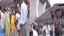 Visuals show people holding the collapsed gate in a row