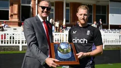 Richard Thompson presents Ben Stokes with a special souvenir.