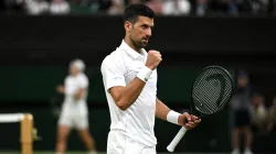 Novak Djokovic celebrates after defeating Lorenzo Musetti in the Wimbledon 2024 semis.