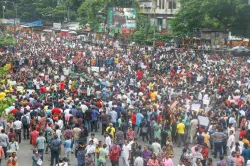 People gather on road amid violent protests in Bangladesh