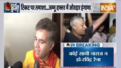 BJP leader Ravinder Raina tries to pacify the protesting party workers