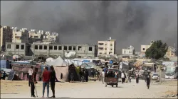 Smoke rises following an Israeli strike on a residential building amid the Israel-Hamas war.