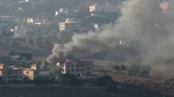 Smoke rises from the southern Lebanese town of Khiam, amid ongoing cross-border hostilities between 