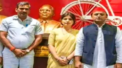 SP leader Nawab Singh Yadav, SP chief Akhilesh Yadav and his MP wife Dimple Yadav