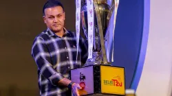 Virender Sehwag with DPL trophy.