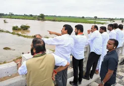 Telangana CM Revanth Reddy inspects a flooded area in Khammam