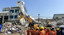 NDRF and SDRF personnel during relief work at the collapsed building