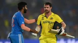 Travis Head with Jasprit Bumrah.