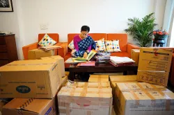  Atishi works amid packed cartons at her Kalkaji home.