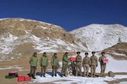 Indian soldiers share sweets with the Chinese soldiers on Diwali at the border region.