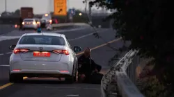 Israeli policemen take cover during an air raid siren amid Israel's conflict with Hezbollah