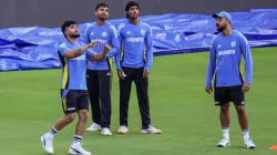 Riyan Parag, Tilak Varma, Jitesh Sharma and Varun Chakravarthy during a practice session.