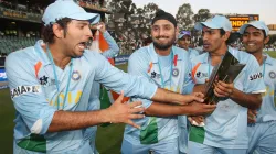 Yuvraj Singh, Harbhajan Singh, Robin Uthappa and Dinesh Karthik with the T20 World Cup trophy.