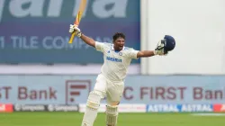 Sarfaraz Khan celebrates his maiden Test century.