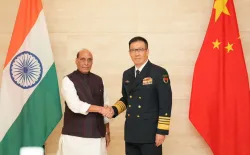 Rajnath Singh with his Chinese counterpart Admiral Dong Jun in Vientiane