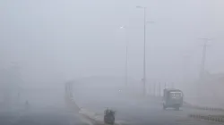 A view of vehicles amid smog along a highway in Multan in Pakistan