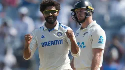 Ravindra Jadeja celebrates Glenn Phillips' wicket.