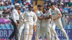 New Zealand players celebrate a wicket.