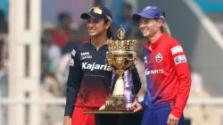 Smriti Mandhana and Meg Lanning pose with the WPL trophy.