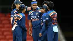 Shikha Pandey celebrates a wicket with her teammates.