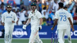 Mohammed Siraj and Travis Head during the duel on Day 2 of the Adelaide Test